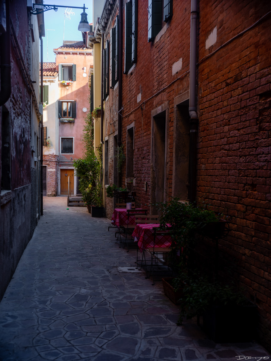 Photos from a trip through Italy in Summer of 2023. Locations include Rome, Florence, Tuscany, Castello di Bossi in Chianti, Siena, San Gimignano, Sirmione on Lake Garda, Bologna, Gudon, Italian Dolomites, Seceda, Cadini di Misurina, and Venice.